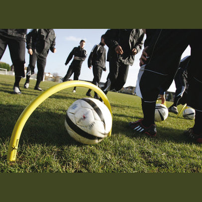 Precision Spiked Passing Arc 20" x 12" outdoor sporting goods with metal spikes for enhanced training and passing accuracy.