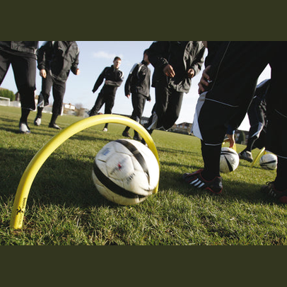 Precision Spiked Passing Arc 20x12 outdoor sporting goods equipment with metal spikes for training and accuracy drills.