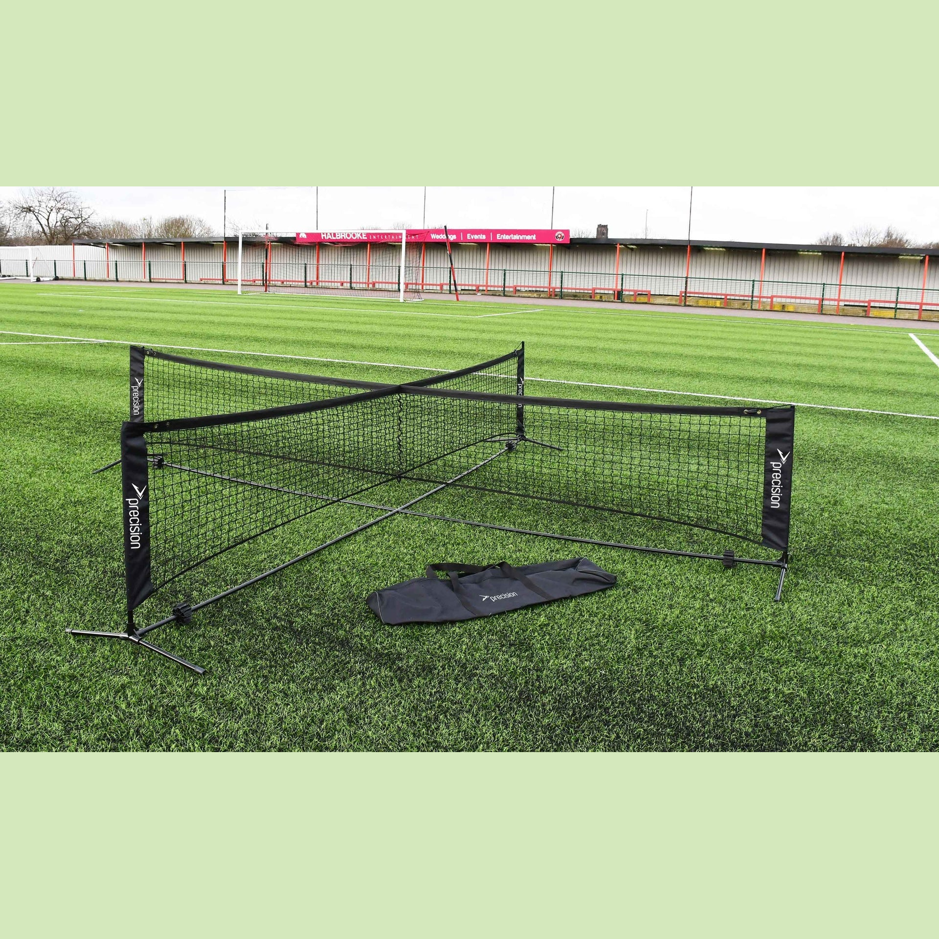 Precision 4 Way Football Tennis Net 14ft x 14ft, showing the durable net with adjustable poles and vibrant team colors.