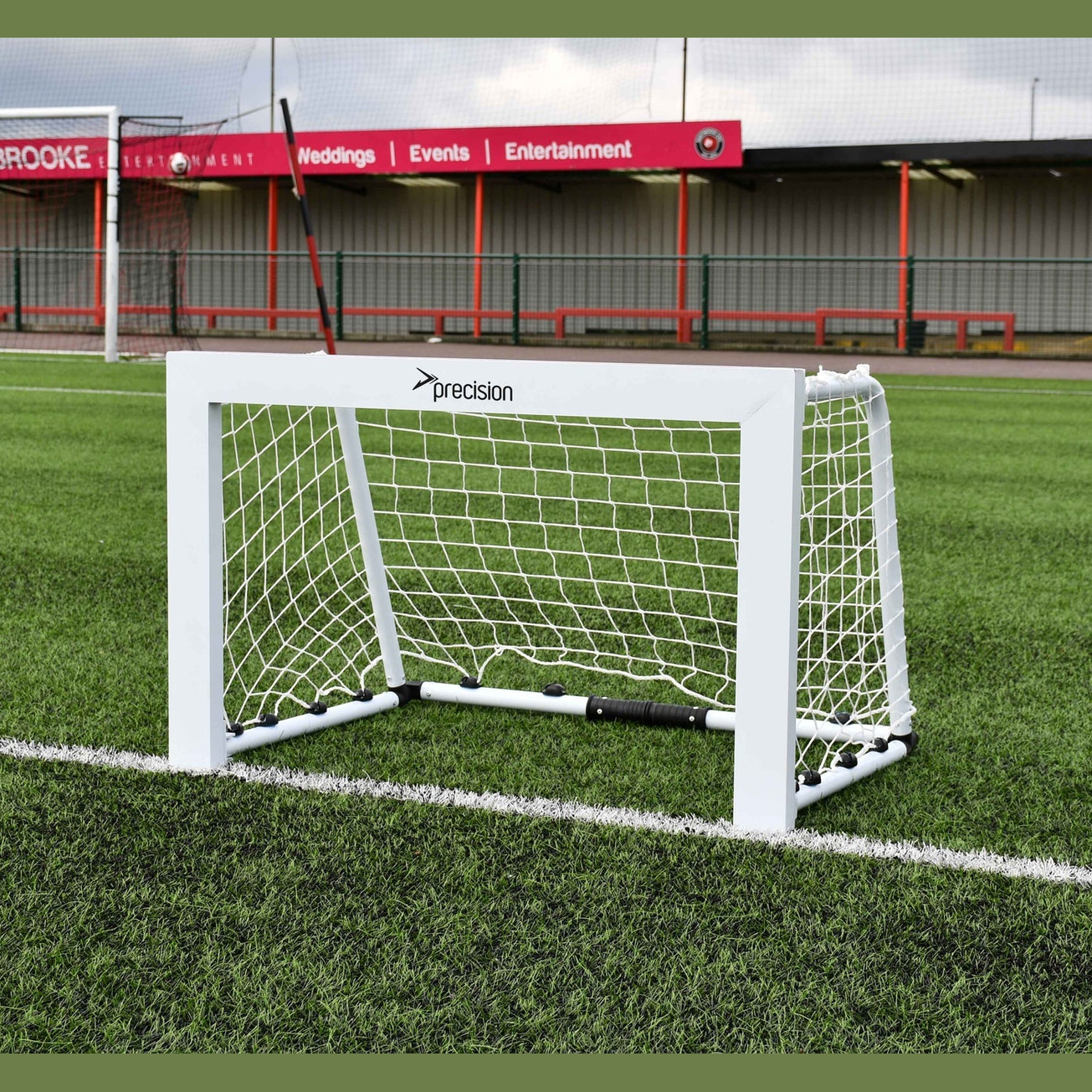 Precision Pro Mini Aluminium Folding Target Goal for sporting goods, shown folded with mesh netting and lightweight metal frame.