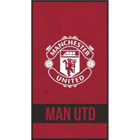 Manchester United identity beach towel by Foco featuring team logo and red and white design, made of soft 100% cotton.