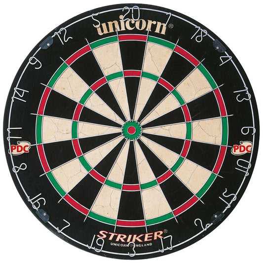 Unicorn Unicorn Striker Bristle Dartboard with colorful target sections, mounted on a wall for indoor dart games.