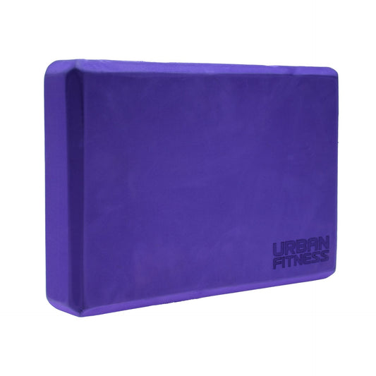 Urban Fitness yoga block in purple, made of foam, showing its rectangular shape and textured surface for support during yoga practice.