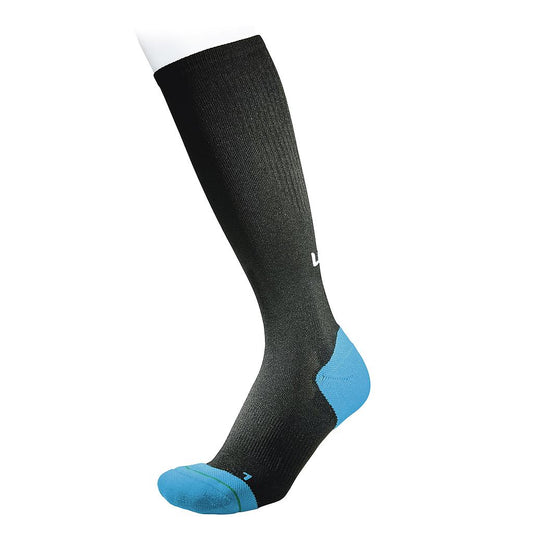 Ultimate Performance compression run and recovery sock in black, designed for athletes to enhance performance and aid recovery.