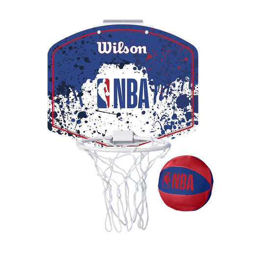 Wilson NBA Mini Basketball Hoop attached to a door with a mini basketball ready for play. Sporting goods for basketball fun.