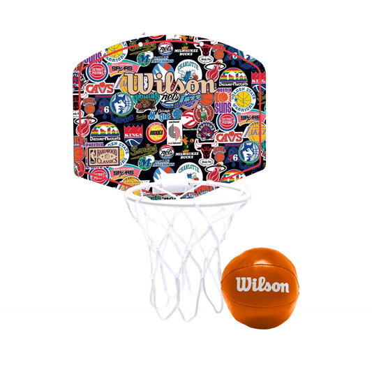 Wilson NBA Team Retro Mini Basketball Hoop mounted on a wall, featuring team logo and colorful backboard for indoor play.