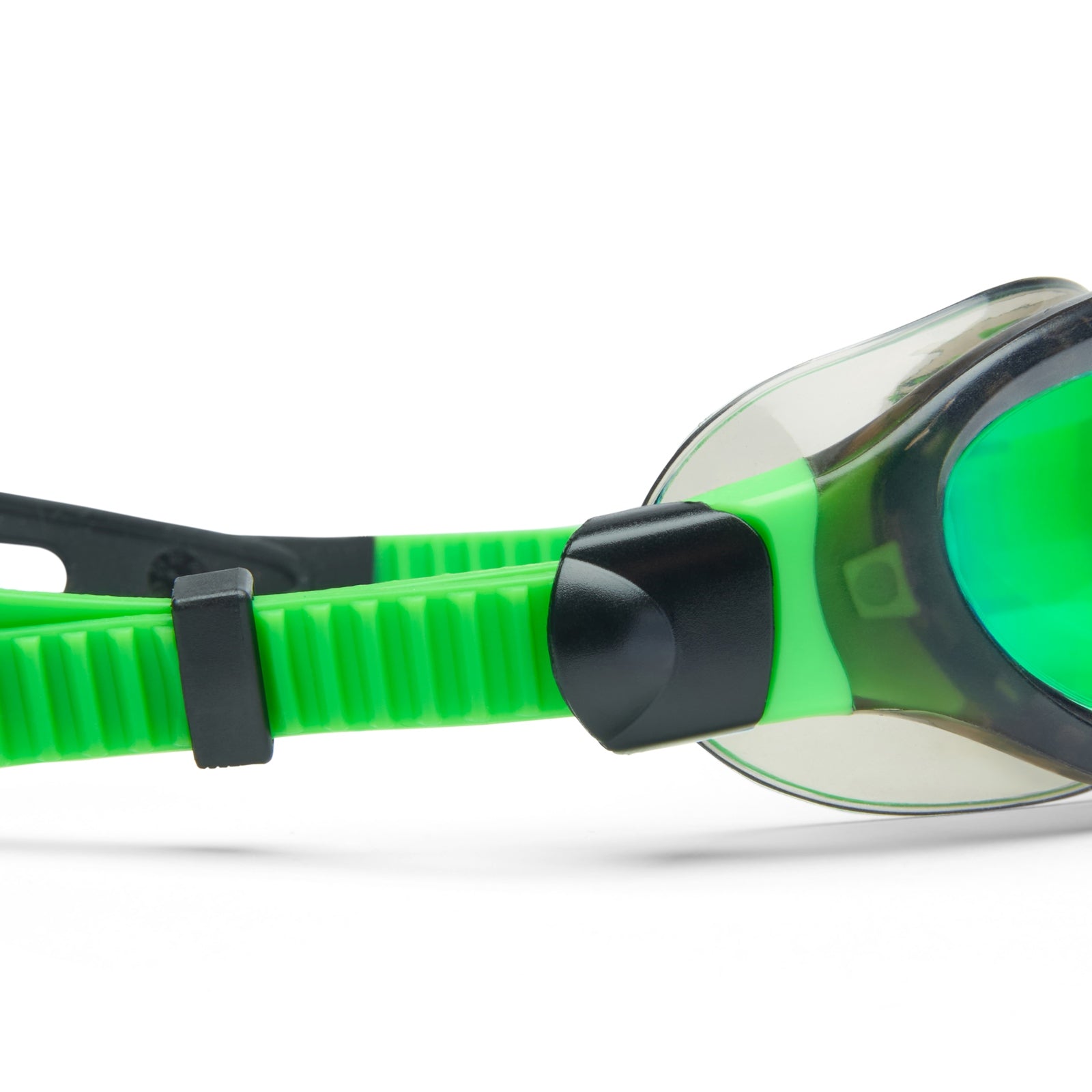 Child wearing Zoggs Jnr Phantom Titanium swimming goggles, clear lenses, adjustable strap, in a pool setting.