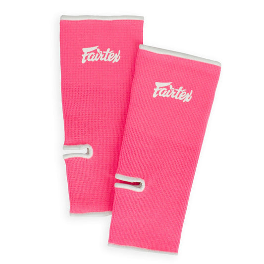 Fairtex pink and white ankle supports, sporting goods, flexible freesize braces for ankle stability and support during sports activities.