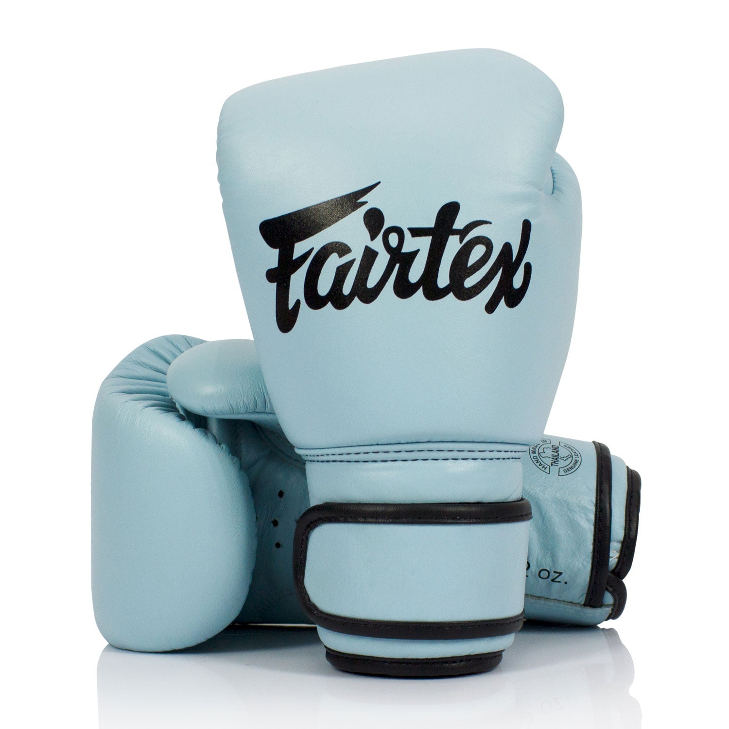Fairtex BGV20 leather boxing gloves in pastel blue with padding and wrist support, designed for training and sparring.