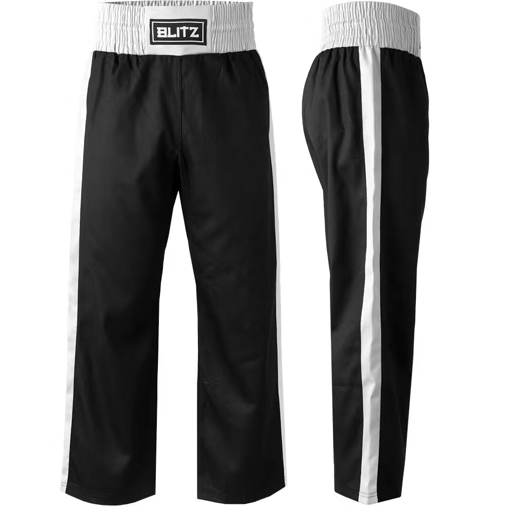 Black and white Blitz adult Defiant kickboxing training trousers made of polycotton fabric, designed for martial arts training.