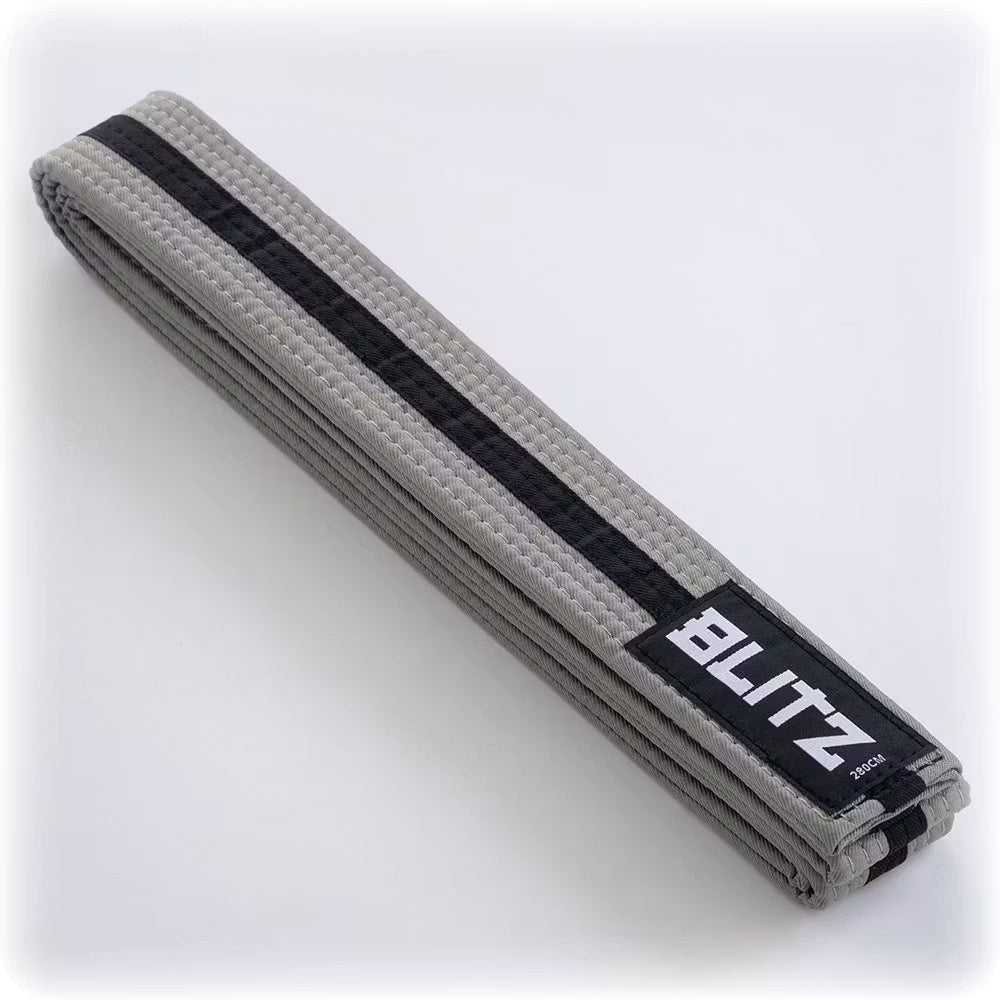 Grey Blitz Colour Belt with black stripe for martial arts grading, showing the woven fabric and stripe detail.