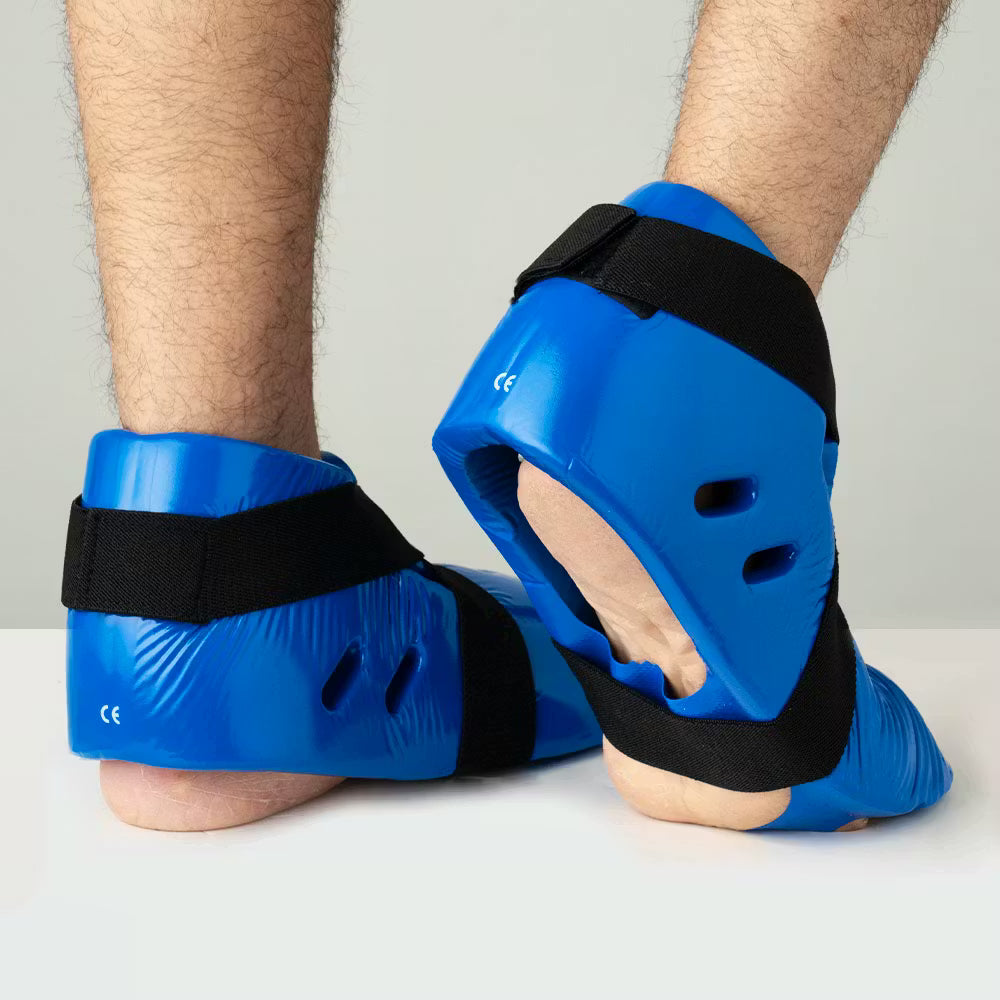 Blitz dipped foam foot guards providing lightweight protection, shown in black with padded design for comfort and safety.