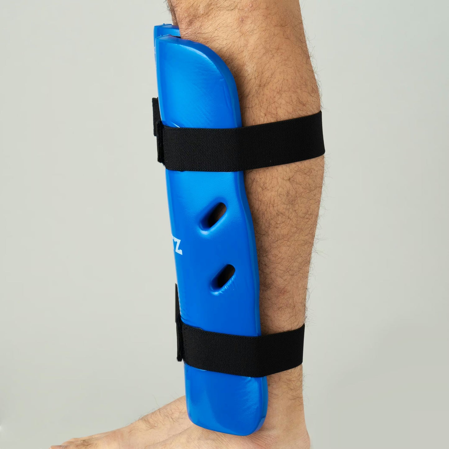Blitz Dipped Foam Shin Guards showing lightweight, padded protection for the shins with black dipped foam exterior.