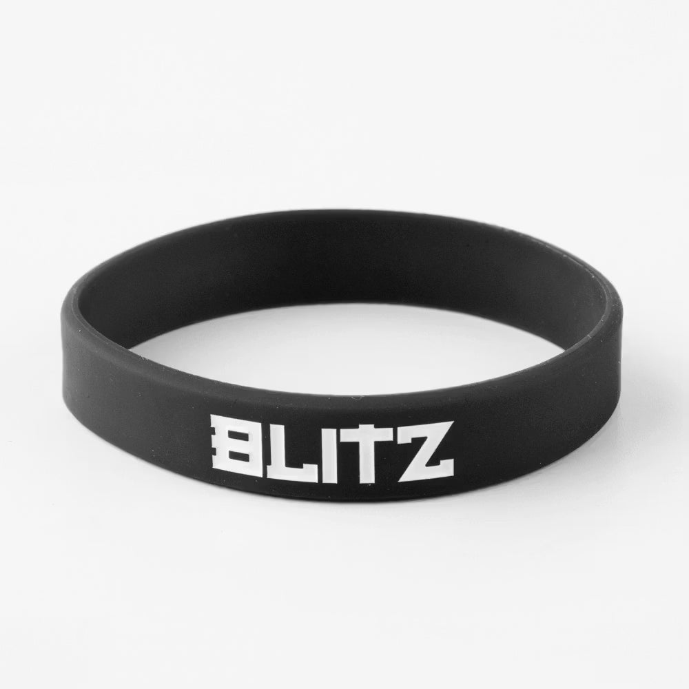 Black Blitz Grading Wrist Band, a belt grade display accessory for sports or martial arts, worn on the wrist.