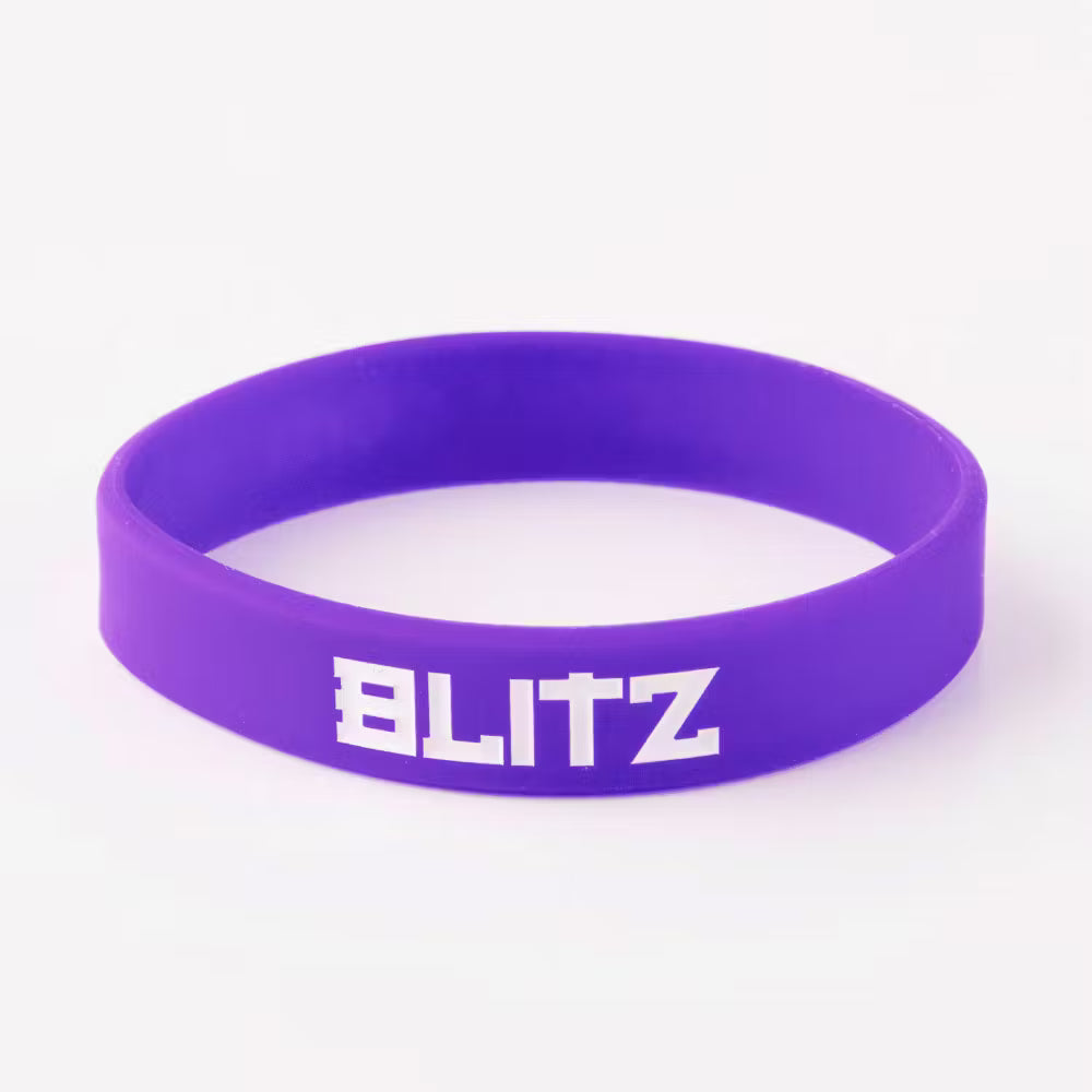 Purple Blitz Grading Wrist Band, a belt grade display accessory, worn on the wrist for belt ranking visibility.