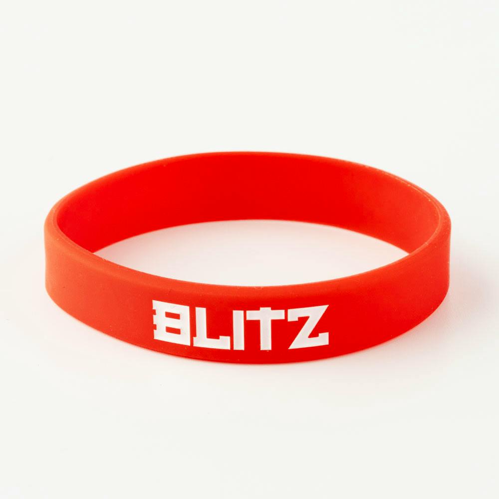 Red Blitz Grading Wrist Band, belt grade display accessory with adjustable strap, used for grading and ranking in sports or events.
