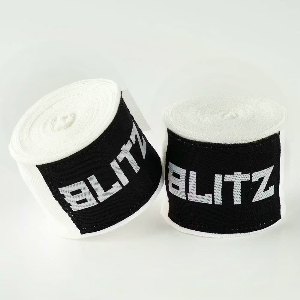 White Blitz boxing hand wraps showing their snug fit and flexible design for hand protection during training and fights.