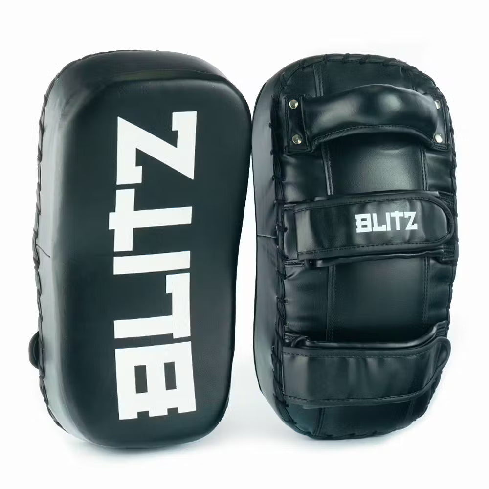 Blitz Havoc Thai Pads made of Nama Hide Leather for martial arts training, showing the padded surface and handles.