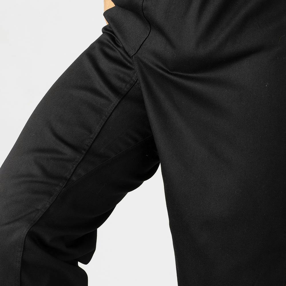 Black and red Blitz Kids Defiant Kickboxing Trousers for youth training, featuring a polycotton fabric and athletic fit.