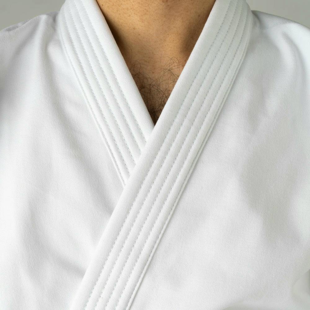 Blitz Kids Odachi Kata Karate Gi in white 14oz, featuring a traditional karate uniform for children with reinforced stitching.