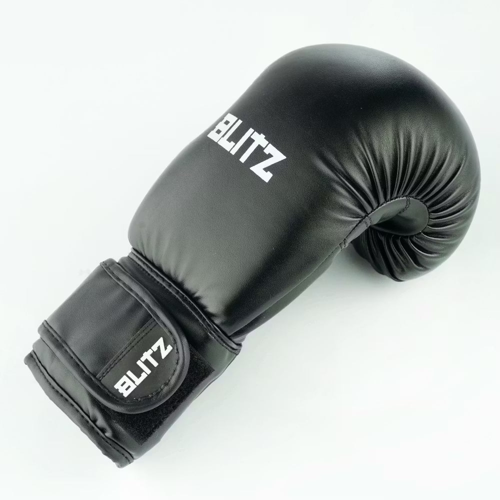 Black Blitz Kids Omega boxing gloves for youth training, featuring padded wrist support and durable synthetic leather construction.
