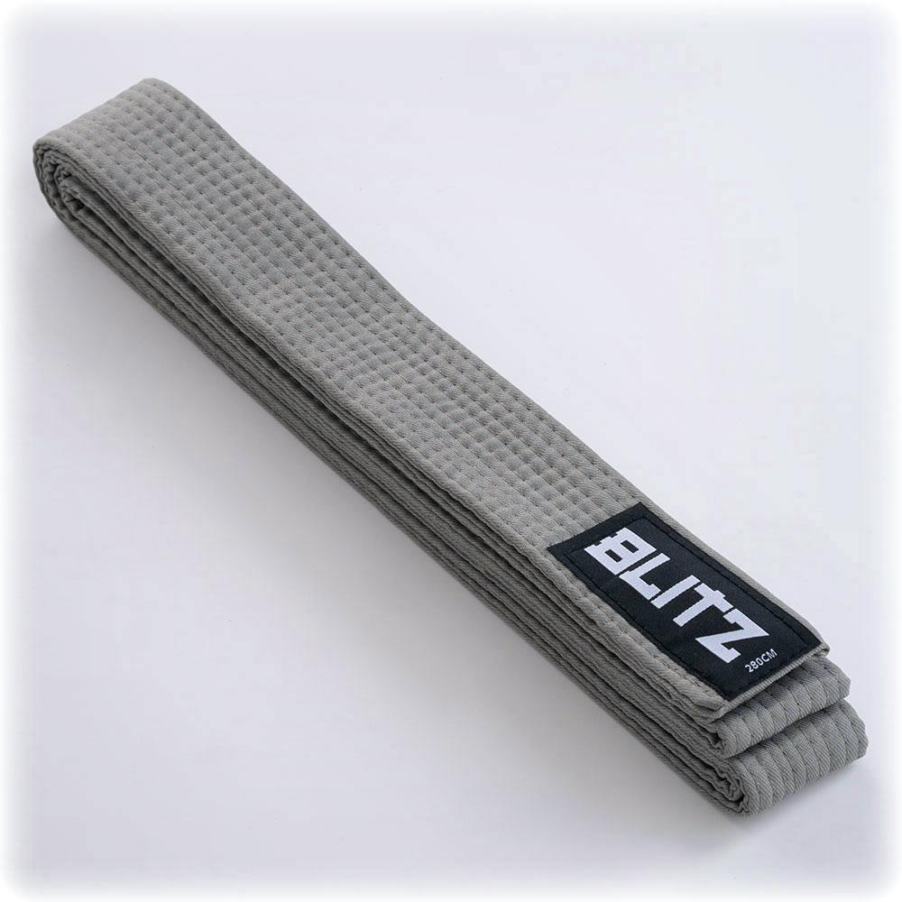 Grey Blitz plain coloured martial arts grading belt, made of durable fabric, with reinforced stitching and a simple, clean design.