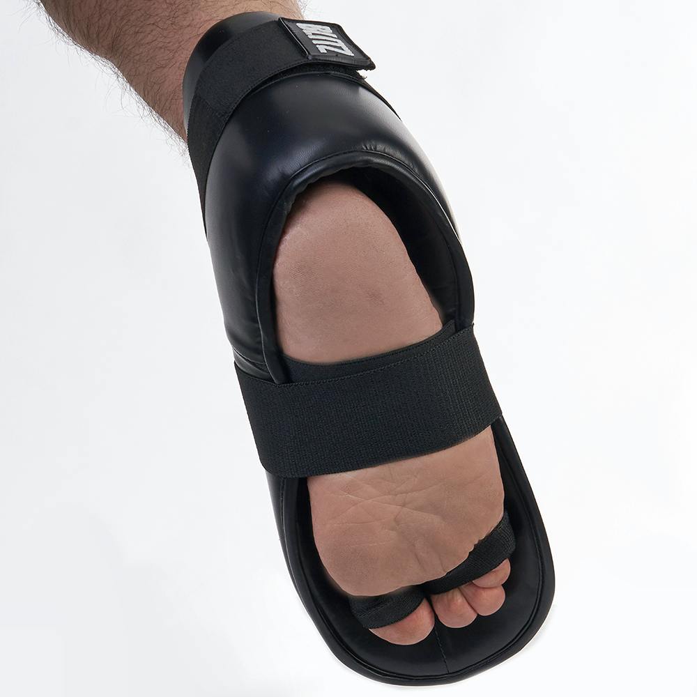 Blitz semi-contact foot protector, lightweight guard for martial arts, showing padded coverage and secure strap design.