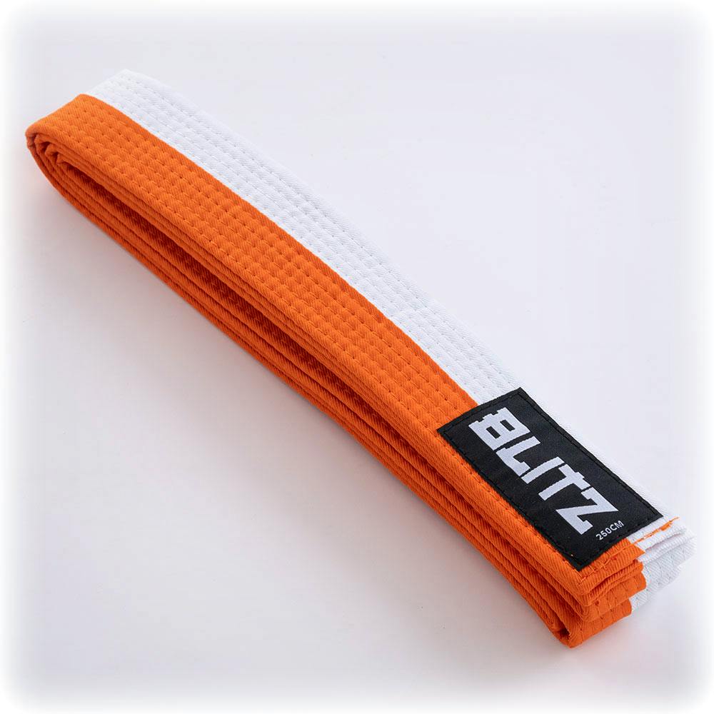 White and orange Blitz split length martial arts belt measuring 4.5cm, with woven fabric and reinforced stitching.