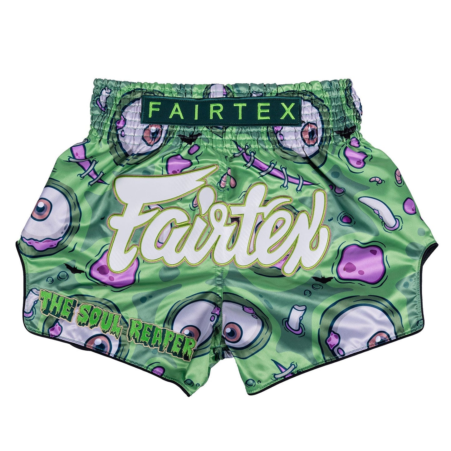 Fairtex Halloween Muaythai shorts featuring a Soul Reaper design, with bold black and orange colors and intricate graphic details.