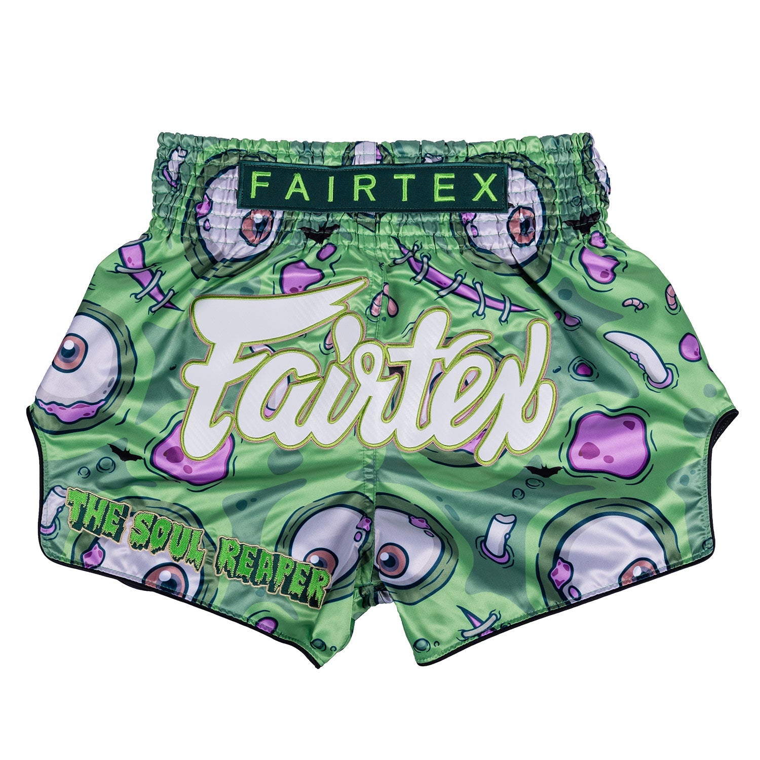 Fairtex Halloween Muaythai shorts featuring a Soul Reaper design, with bold black and orange colors and intricate graphic details.