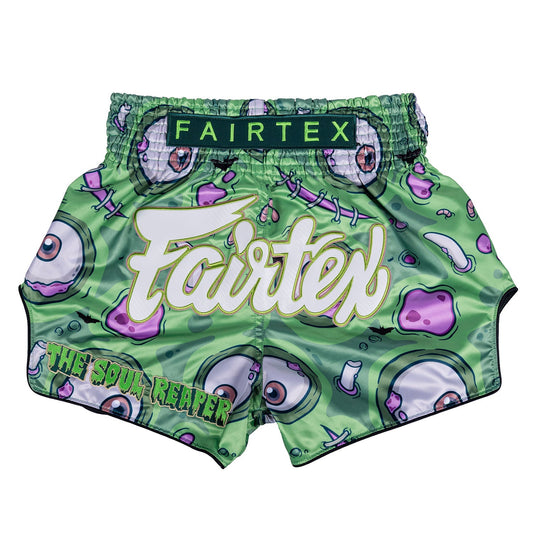 Fairtex Halloween Muaythai shorts featuring a Soul Reaper design, with bold black and orange colors and intricate graphic details.