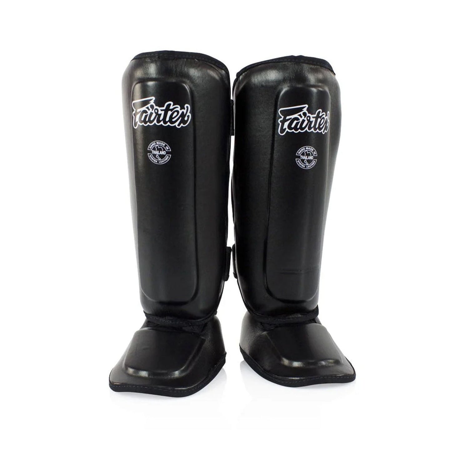 Black Fairtex SPK9 Kids Shin Pads designed for martial arts or sports training, showing padded shin protection for children.