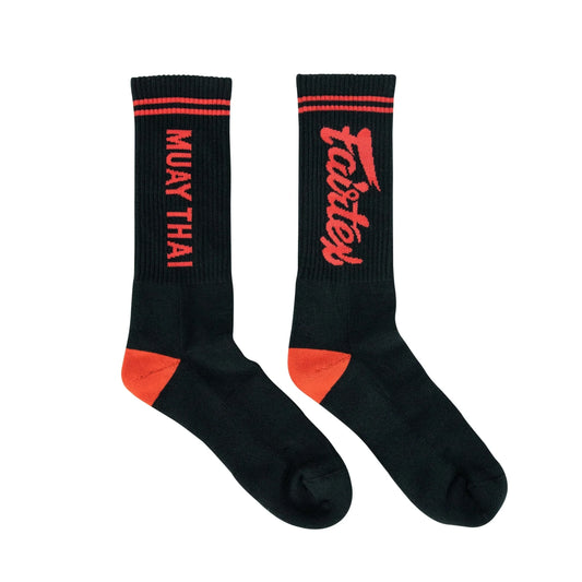 Fairtex sports socks in black and red, designed for athletic performance and comfort, with visible logo and reinforced heel.