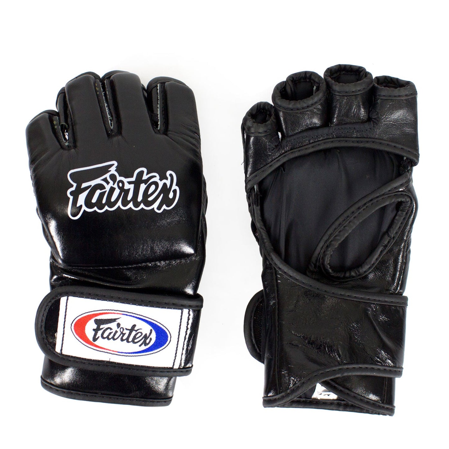 Black Fairtex FGV12 Ultimate MMA gloves with padded palms and adjustable wrist straps for combat sports and training.