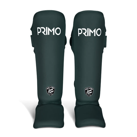 Primo Classic Muay Thai shinguard in hunter green with padded design for protection during martial arts training.