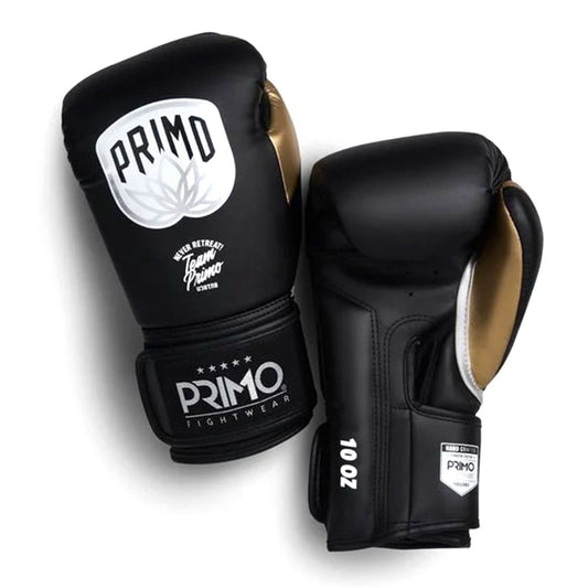 Primo Emblem 2.0 semi-leather boxing gloves in black and gold, sporting goods for training and fight protection.