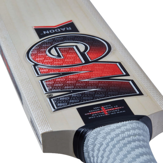Gunn & Moore GM Radon English Willow cricket bat with embossed design, showcasing its sturdy wooden construction and handle.