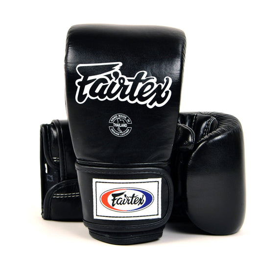 Fairtex black cross-trainer bag gloves for boxing and training, with padded wrist support and durable synthetic leather construction.
