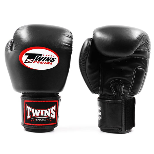 Black Twins Special BGVL3 boxing gloves with padded wrist support and branding, designed for training and competitive boxing.
